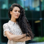 Portrait of confident businesswoman showing a face of determination