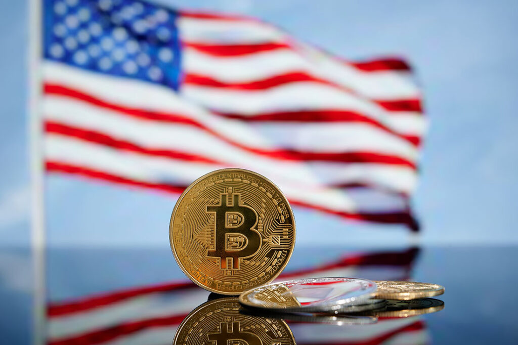 Bitcoin golden coin on American flag